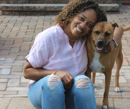 Woman hugging her dog